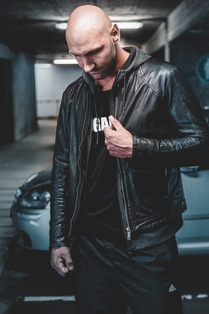 man wearing black leather jacket 952093